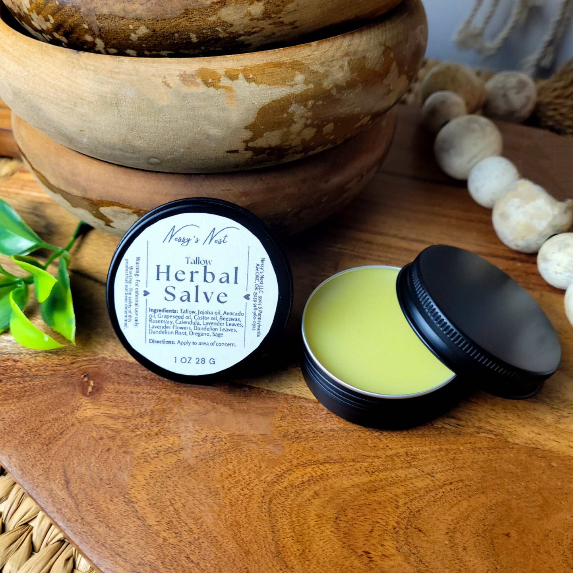 tallow herbal salve skin cream in black tin can 